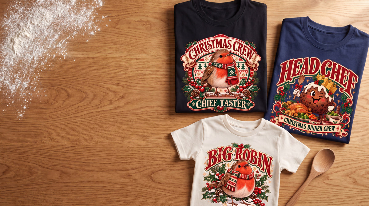 Family Christmas t-shirts on an oak table