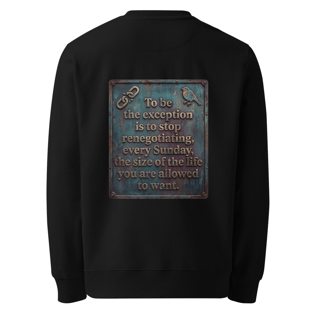 Stop Renegotiating sweater, black — back view of dark leather slogan plate with chain detail and robin, reading "To be the exception is to stop renegotiating, every Sunday, the size of the life you are allowed to want." — Ricki Robin