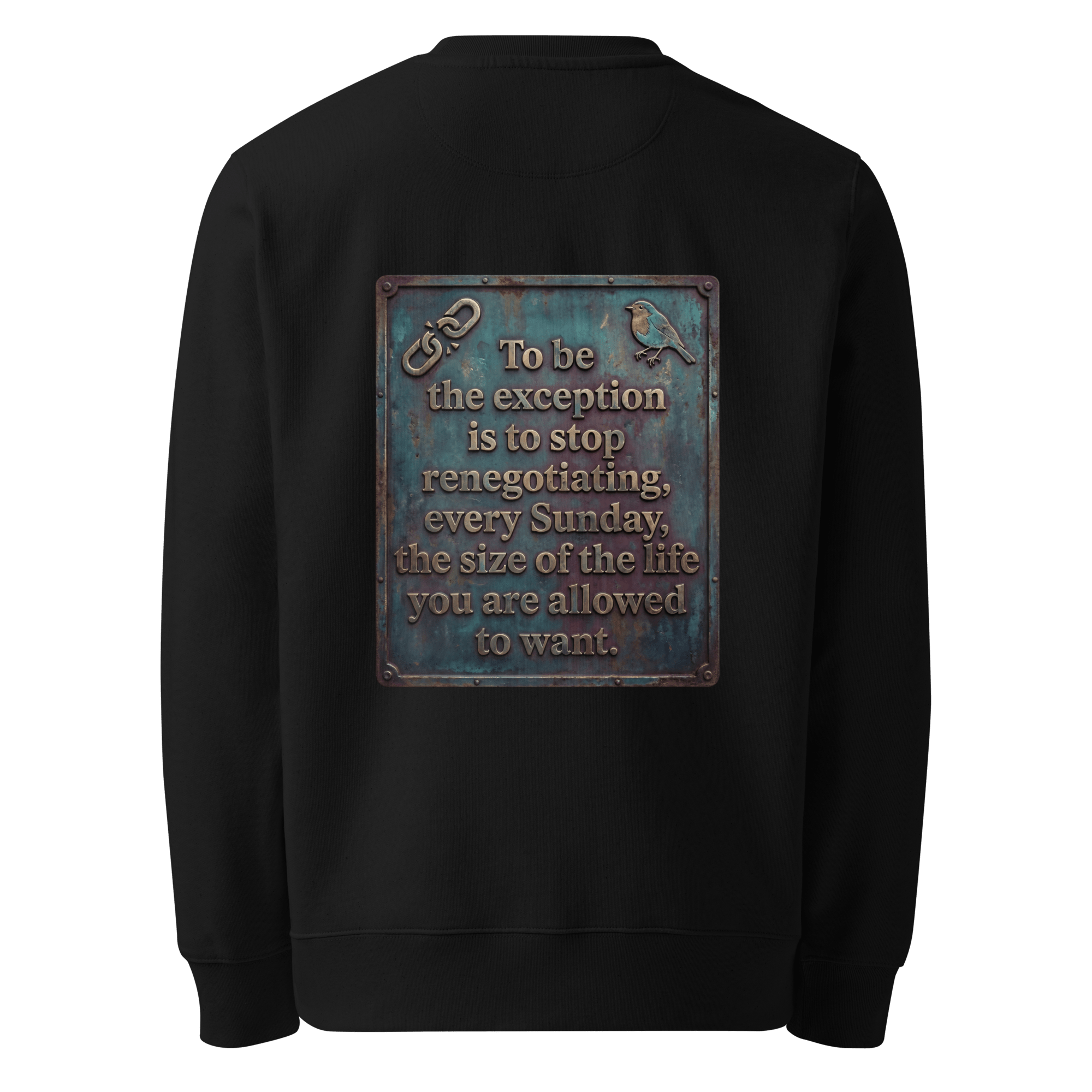 Stop Renegotiating sweater, black — back view of dark leather slogan plate with chain detail and robin, reading "To be the exception is to stop renegotiating, every Sunday, the size of the life you are allowed to want." — Ricki Robin