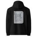 Quietly Held hoodie, black — back view of torn paper slogan plate with robin, reading "In the hour after the day stopped photographing itself, the standard was quietly held to, without an audience left to confirm it." — Ricki Robin