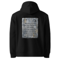 Long Before Easy hoodie, black — back view of worn metal slogan plate with robin, reading "Mastery is not the day the work felt easy. It is the year the work was done long before easy arrived." — Ricki Robin