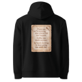 Made Anyway hoodie, black — back view of coffee-stained paper slogan plate with robin, reading "There was a morning that almost did not happen. Coffee was made anyway, by hands deciding to keep going one more day." — Ricki Robin