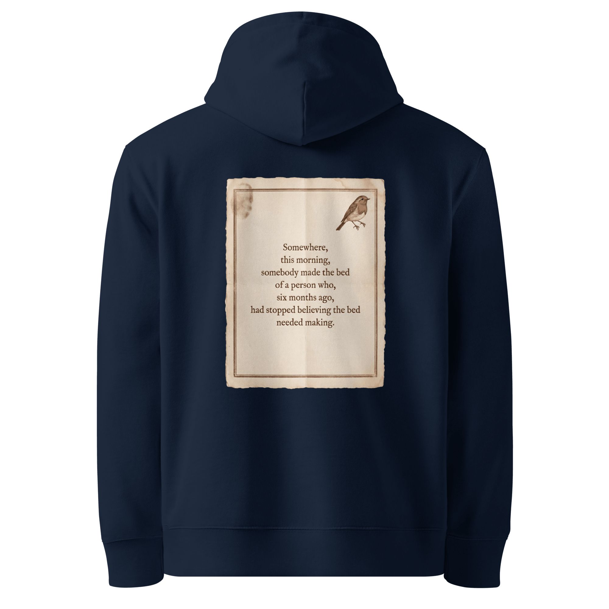 Made The Bed hoodie, French Navy — back view of aged paper slogan plate with robin, reading "Somewhere, this morning, somebody made the bed of a person who, six months ago, had stopped believing the bed needed making." — Ricki Robin